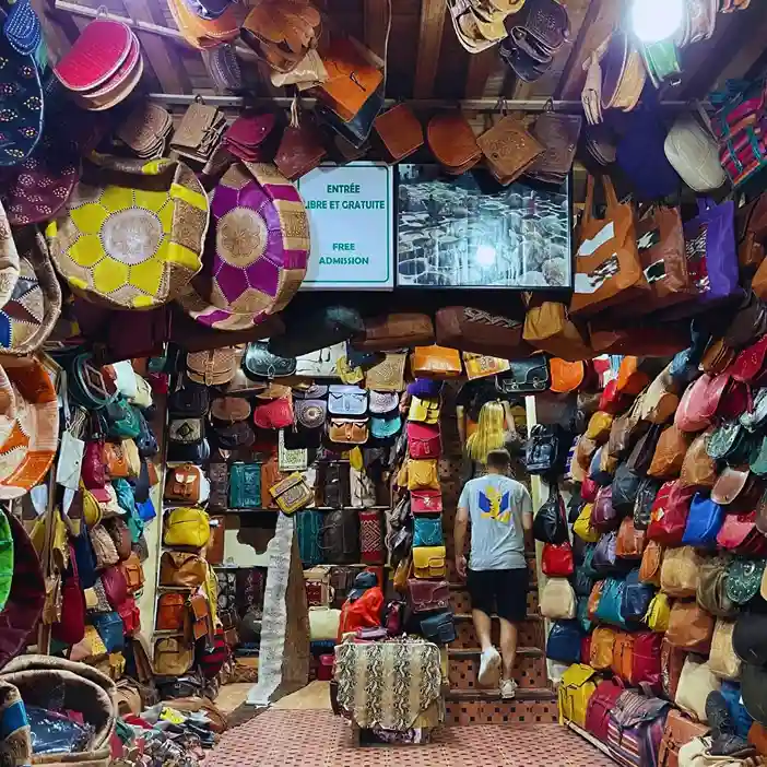 Fez artisan hero — zellige cutter at work Leather goods, Fez