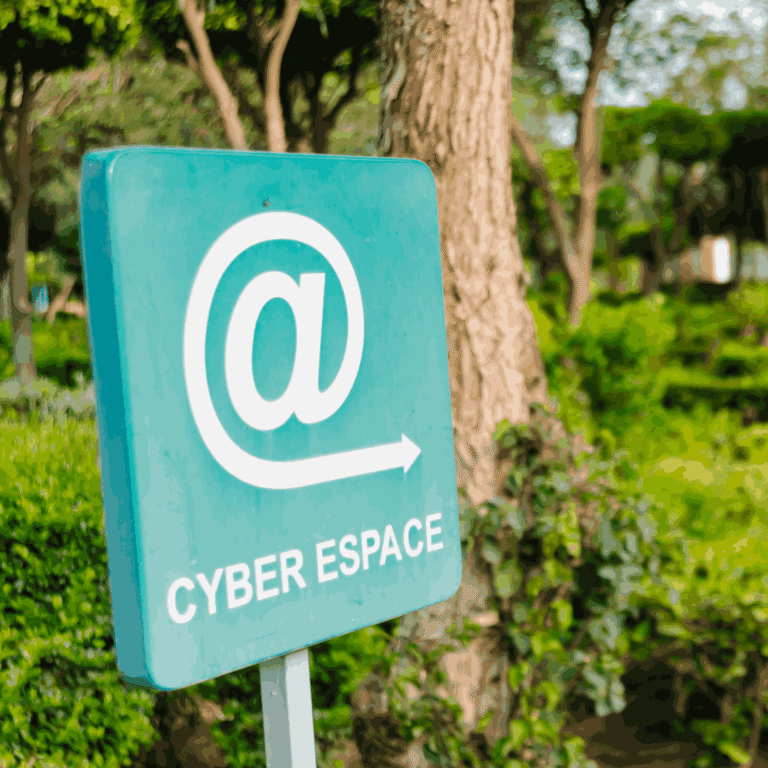 Free things to do in Marrakech | Cyber Park sign with free WiFi icon, shaded walkway, and lush orange trees in the background. Visit Morocco Tours