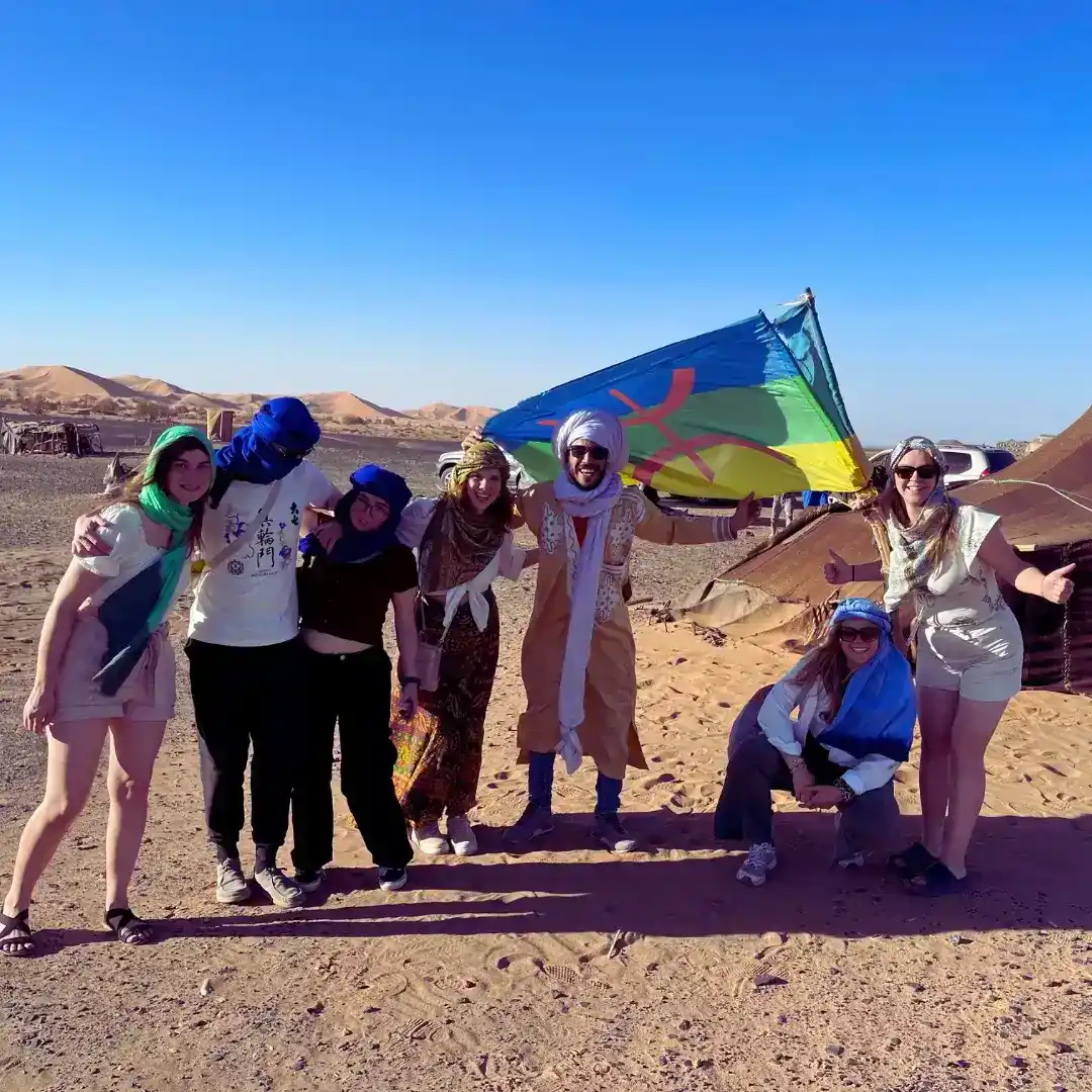 Individual Client 2 Our Local guide is leading a personalised tour with travellers in the Merzouga desert, Morocco. Visit Morocco Tours