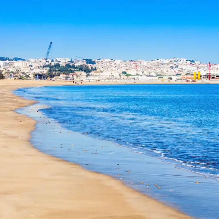 Visit Tangier beach with golden sand and blue water on personalised tours. Visit Morocco Tours