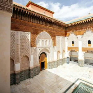 Visit Ben Youssef Madrasa Marrakech – historic Islamic college with intricate Moroccan tilework, stucco carvings, and peaceful courtyard. Visit Morocco Tours