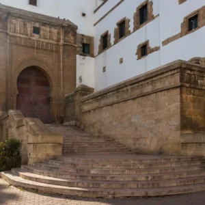 Mahkama du Pacha- Guided Tour showcasing ornate doors and courtyards in Casablanca. Visit Morocco Tours