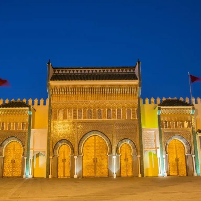 Golden doors and intricate architecture at the Royal Palace in Fez Morocco. Visit Morocco Tours