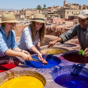 Fez Leather Dyeing Experience at the tannery with a happy tourist. Visit Morocco Tours