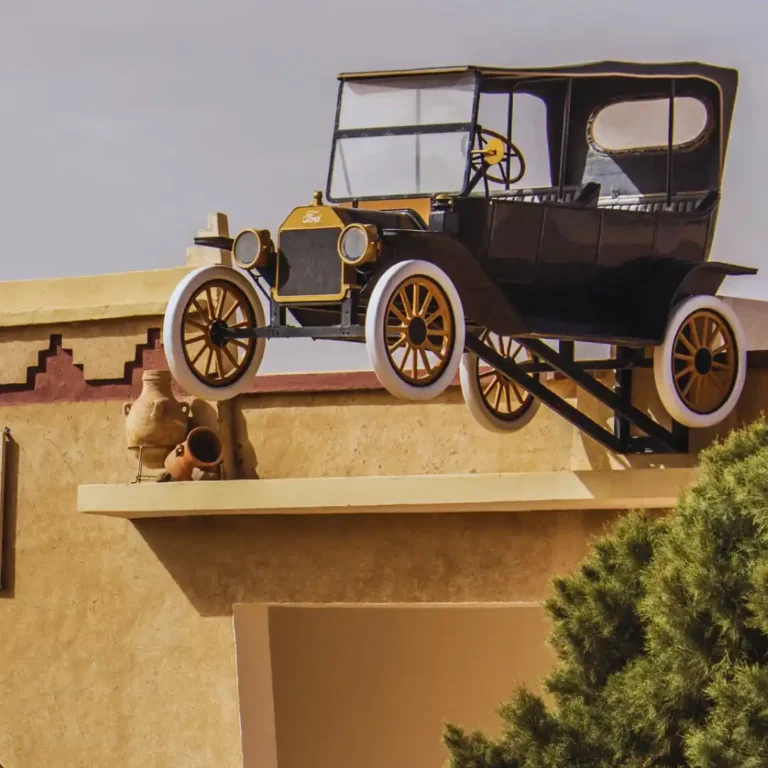 Morocco National 4X4 Auto Museum Guided Tour with Visit Morocco Tours, showcasing historic 4X4 vehicles in the Sahara desert.