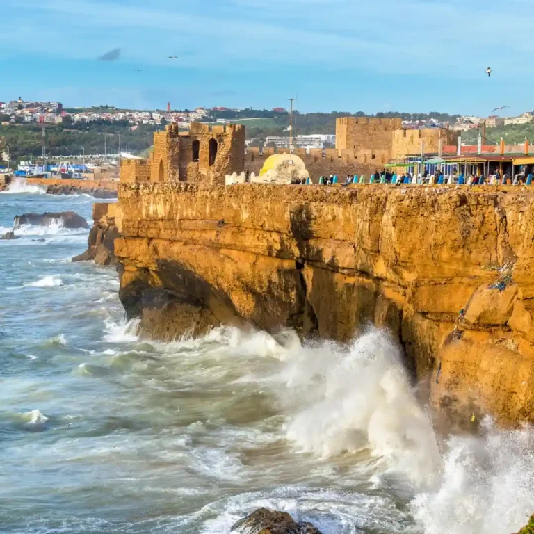 The dramatic cliffs and powerful Atlantic Ocean waves crashing on the coast of Safi, Morocco. Visit Morocco Tours
