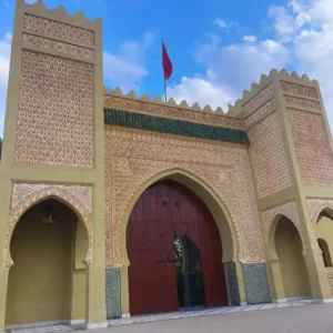 The ornate entrance and courtyard of the Mausoleum of Moulay Ali Cherif, founder of the Alaouite dynasty, in Rissani, Morocco. Visit Morocco Tours